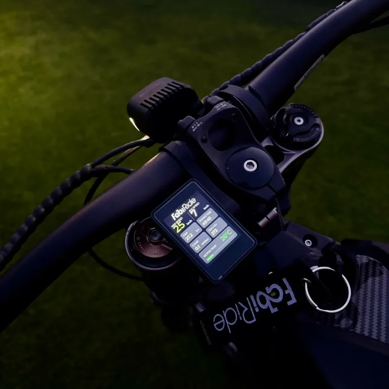 Dash Pro on a bike showing live speed and ride data on its colour screen